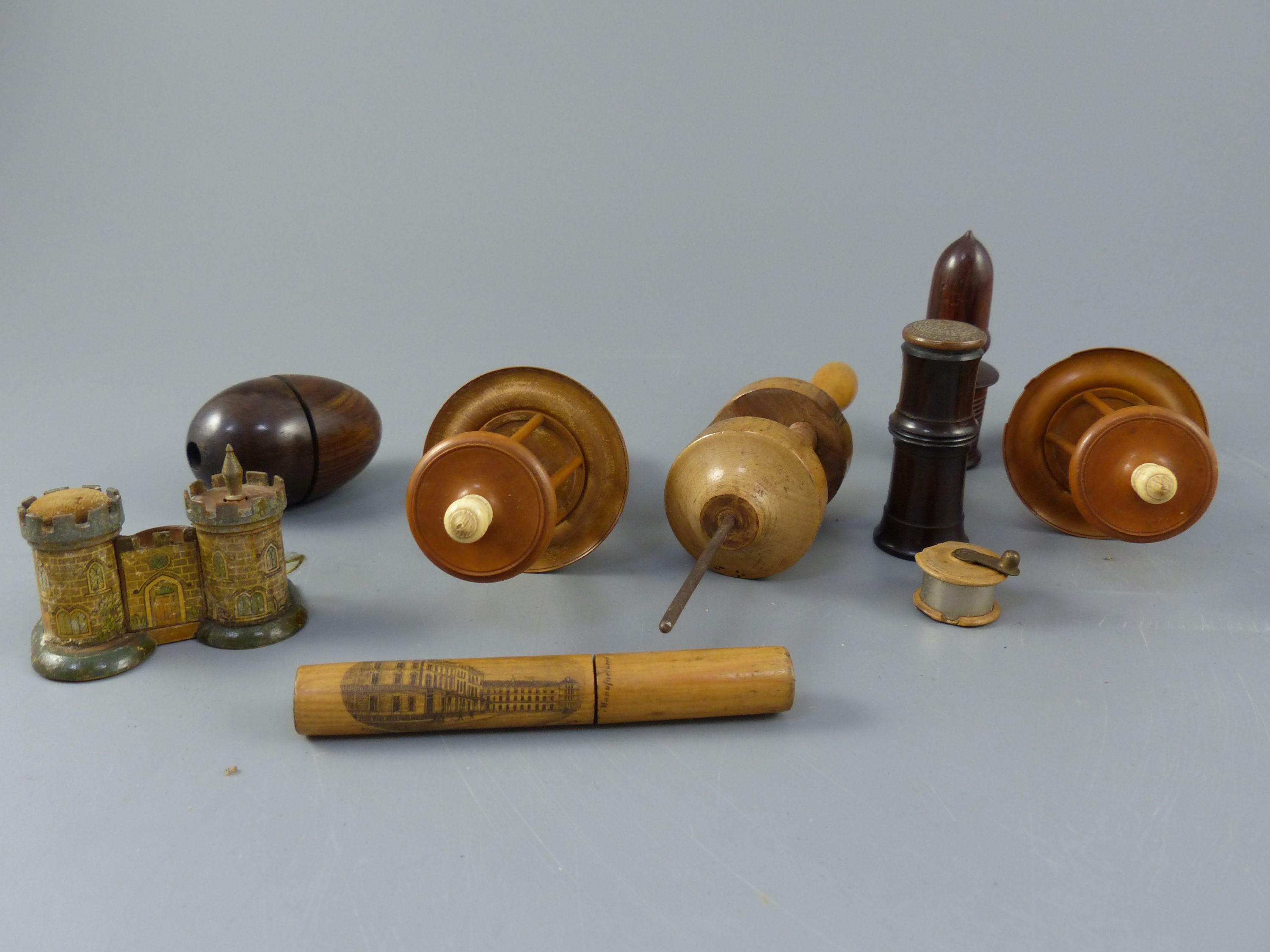 A group of Victorian treen sewing accessories